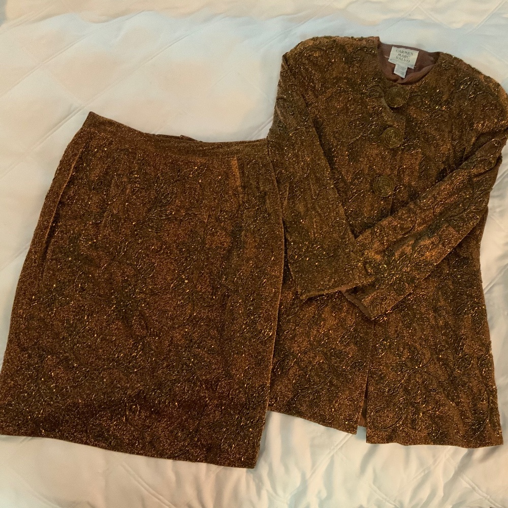 Cocktail suit with long jacket and short skirt